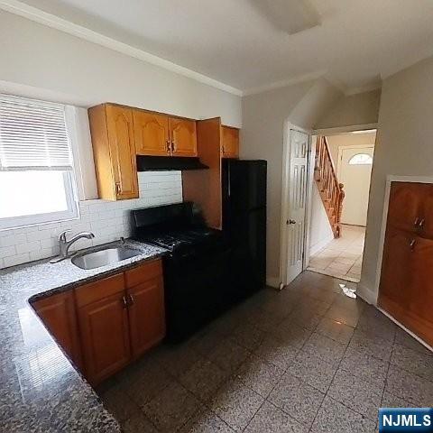 167 James Street Hackensack, NJ 07601 - Photo 15 of 30 a kitchen with stainless steel appliances granite countertop a refrigerator and a sink