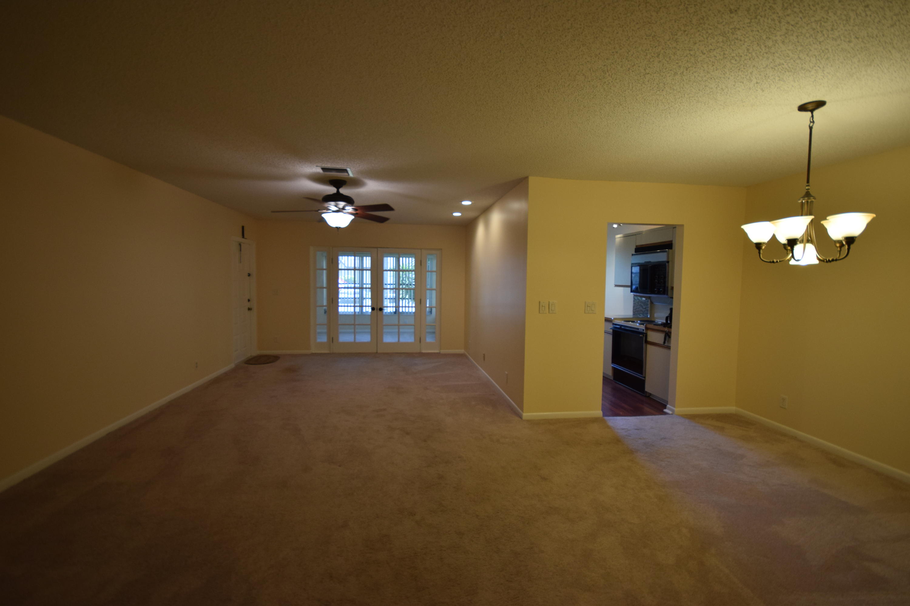 13930 Nesting Way, Unit C Delray Beach, FL 33484 - Photo 2 of 13 Living Room/Dining Room