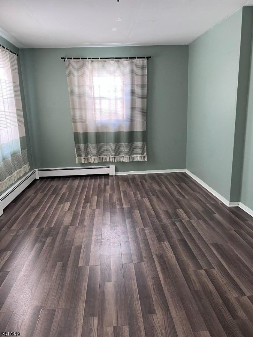 126 Metro Trail Hopatcong, NJ 07843 - Photo 11 of 14 an empty room with wooden floor and windows