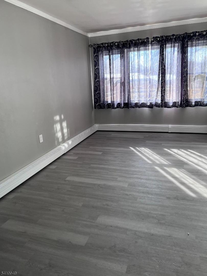 126 Metro Trail Hopatcong, NJ 07843 - Photo 5 of 14 wooden floor in an empty room with a window