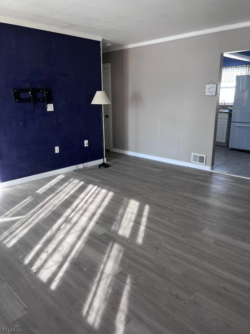 126 Metro Trail Hopatcong, NJ 07843 - Photo 6 of 14 a view of a livingroom with wooden floor