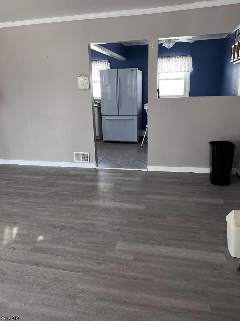 126 Metro Trail Hopatcong, NJ 07843 - Photo 7 of 14 a view of an empty room with wooden floor and a window