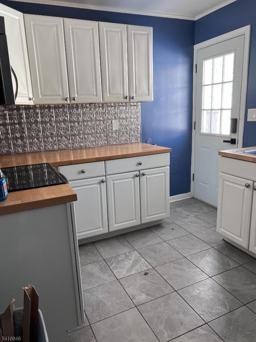 126 Metro Trail Hopatcong, NJ 07843 - Photo 8 of 14 a kitchen with cabinets and window