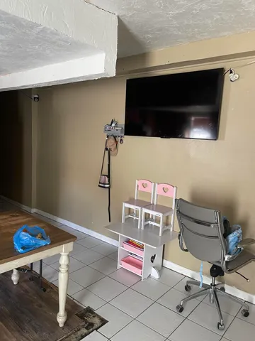 a living room with a couch and a table