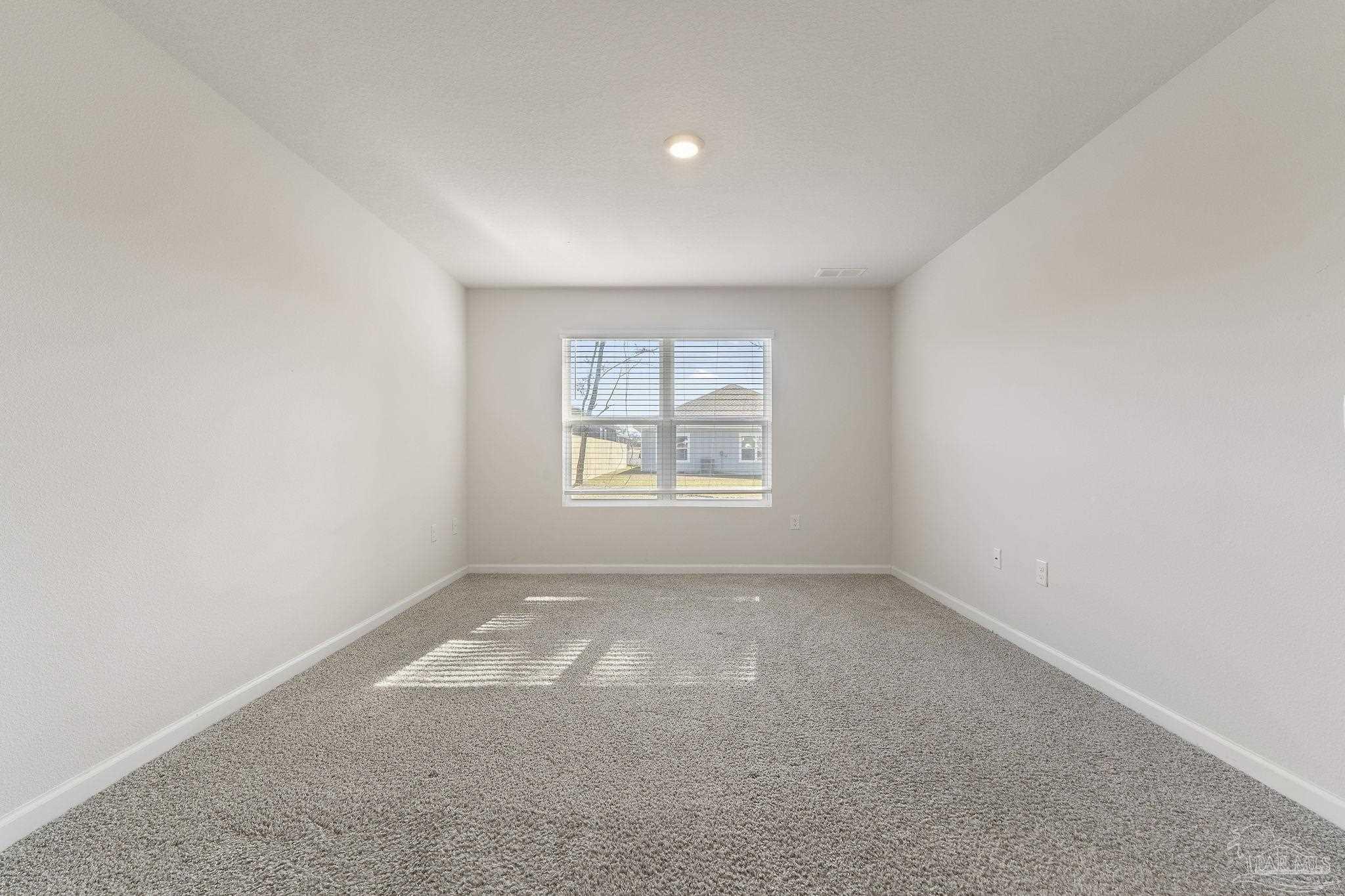 8669 Pathstone Boulevard Pensacola, FL 32526 - Photo 19 of 36 an empty room with a window