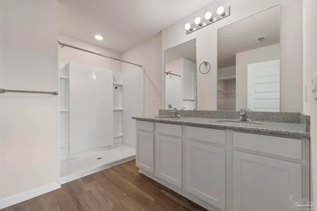 a view of a room with racks on the wall