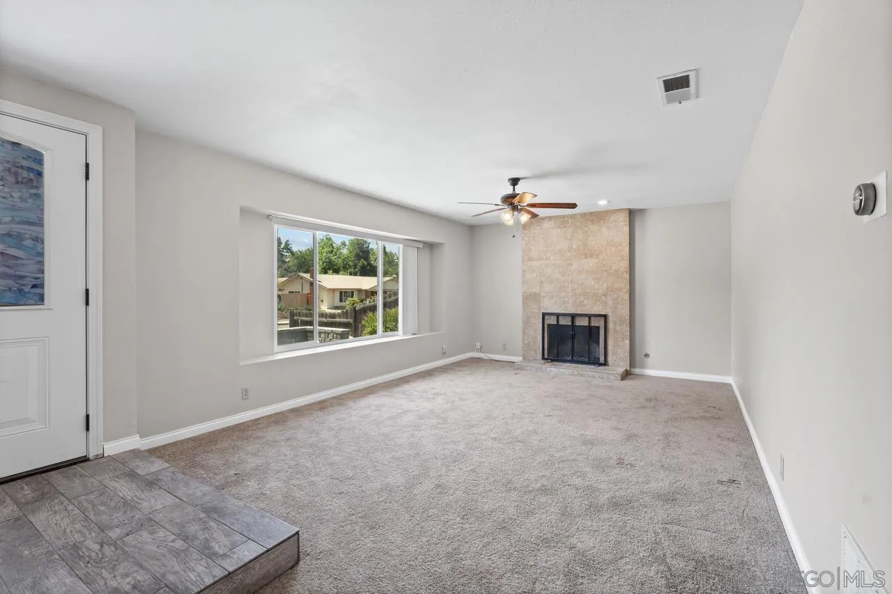 14932 Cinchring Drive Poway, CA 92064 - Photo 3 of 14 an empty room with windows