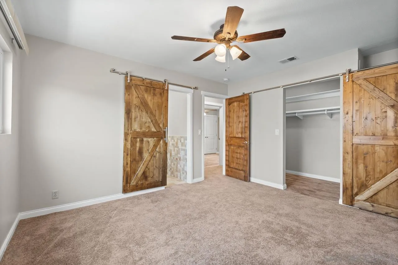 14932 Cinchring Drive Poway, CA 92064 - Photo 9 of 14 a view of a livingroom with a ceiling fan