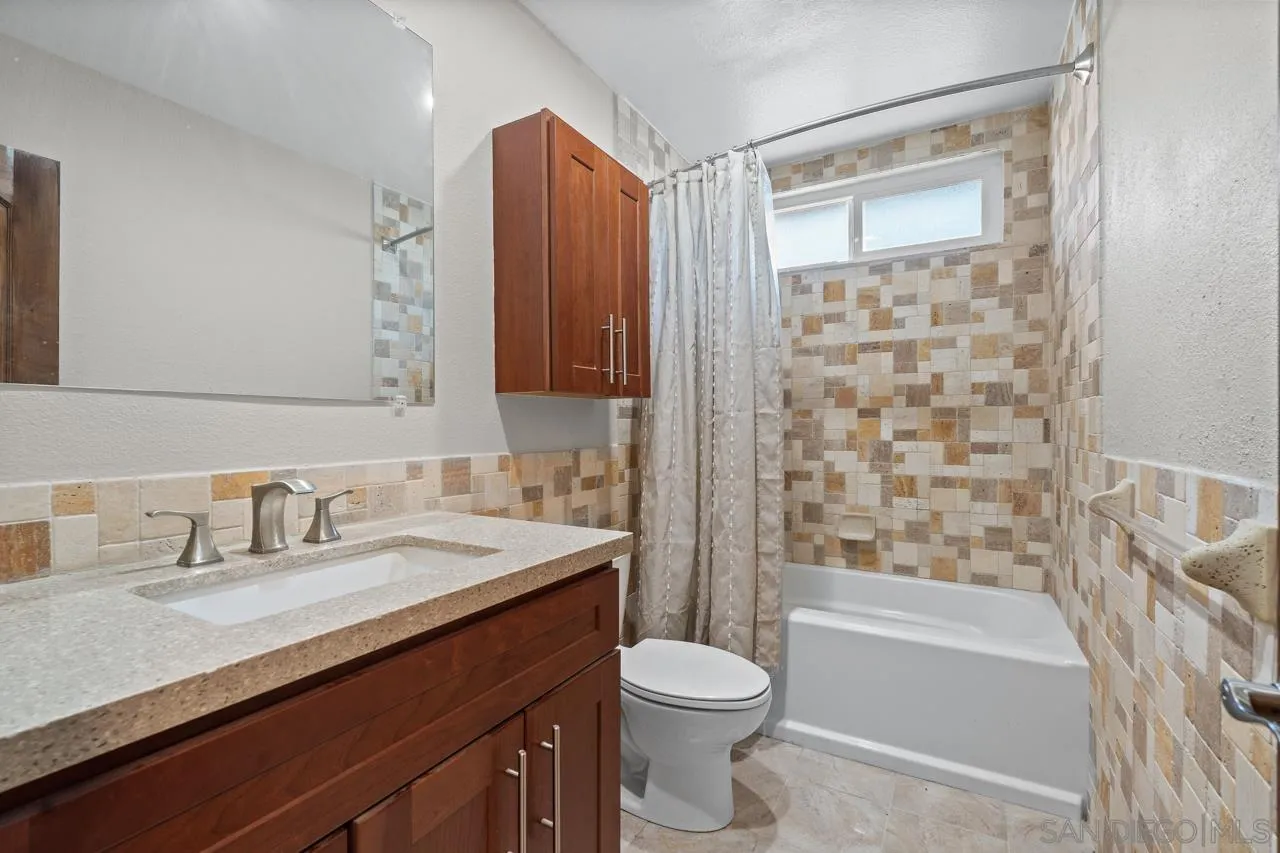 14932 Cinchring Drive Poway, CA 92064 - Photo 10 of 14 a bathroom with a sink a toilet and shower