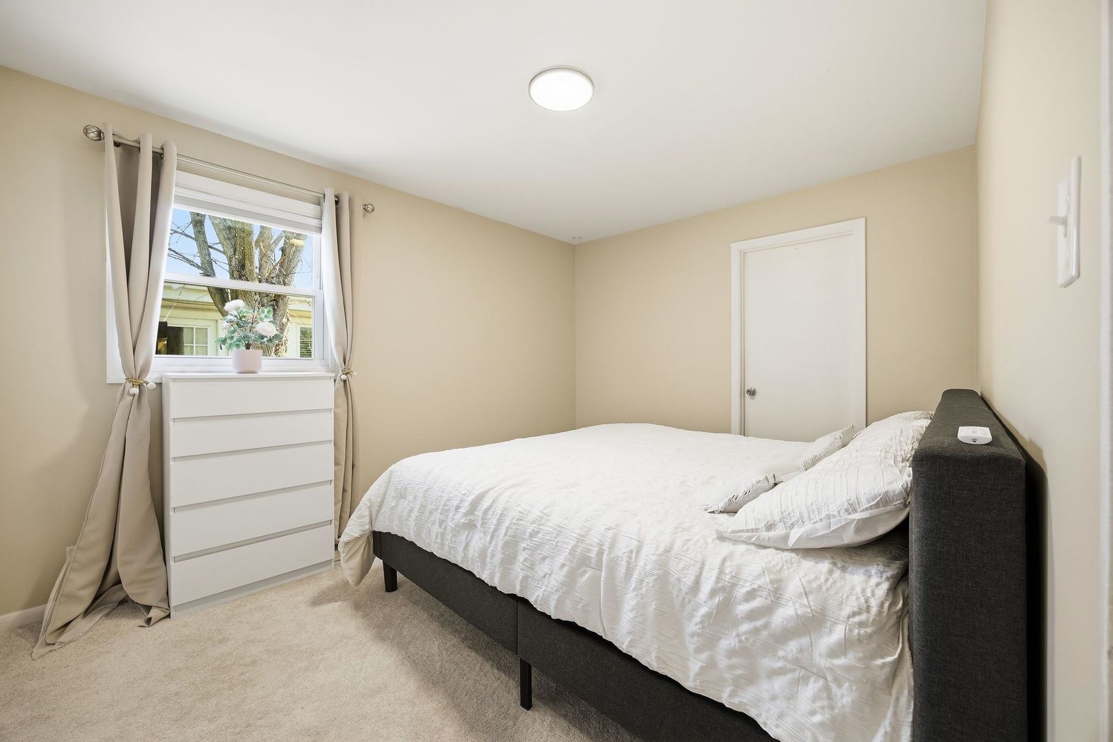 2117 Grouse Lane Rolling Meadows, IL 60008 - Photo 14 of 25 a bedroom with a bed and a window