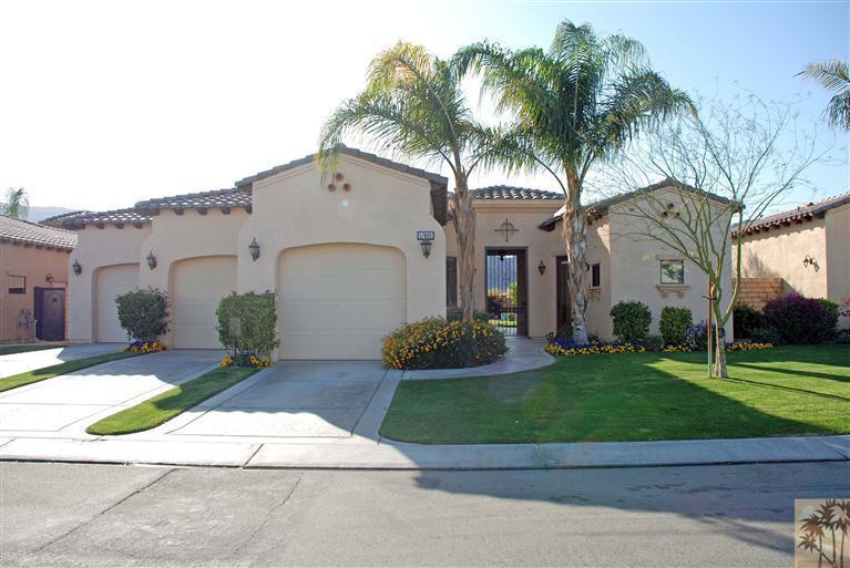 57695 Santa Rosa Trail La Quinta, CA 92253 - Photo 1 of 11 a front view of a house with a garden and plants