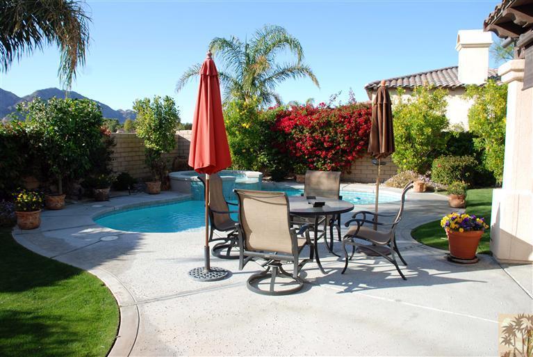 57695 Santa Rosa Trail La Quinta, CA 92253 - Photo 11 of 11 a view of a patio with a table and chairs and potted plants