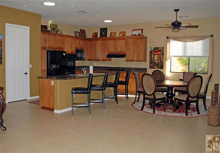 57695 Santa Rosa Trail La Quinta, CA 92253 - Photo 4 of 11 a view of a dining room with furniture and a window