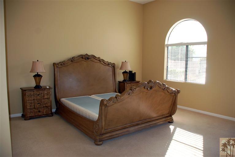 57695 Santa Rosa Trail La Quinta, CA 92253 - Photo 5 of 11 a bed sitting in a bedroom next to a window