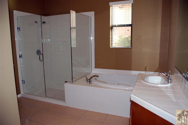 57695 Santa Rosa Trail La Quinta, CA 92253 - Photo 6 of 11 a bathroom with a bathtub and a sink