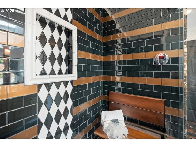 a view of bathroom with a shower and a sink