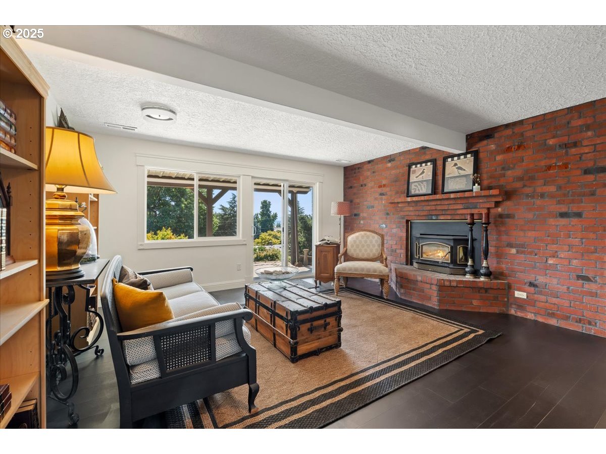 8014 Southeast Middle Way Vancouver, WA 98664 - Photo 27 of 47 a living room with furniture and a fireplace