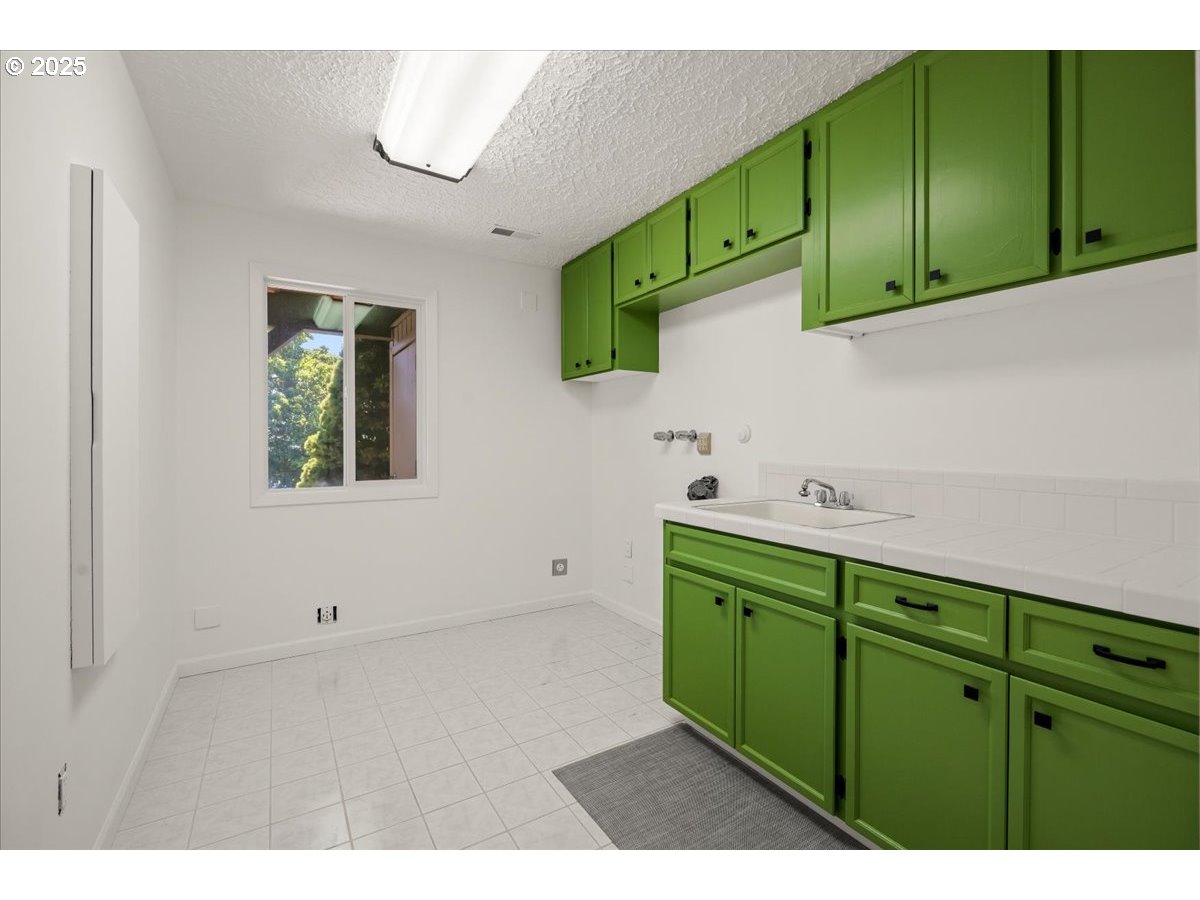 8014 Southeast Middle Way Vancouver, WA 98664 - Photo 29 of 47 a bathroom with a sink and a mirror