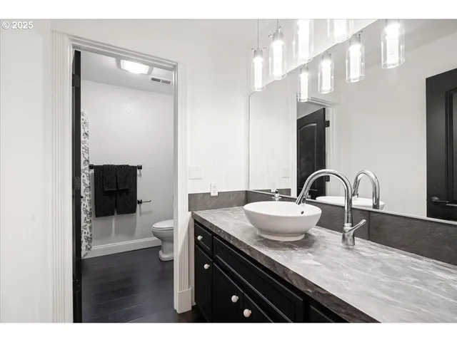 a view of a balcony with wooden floor