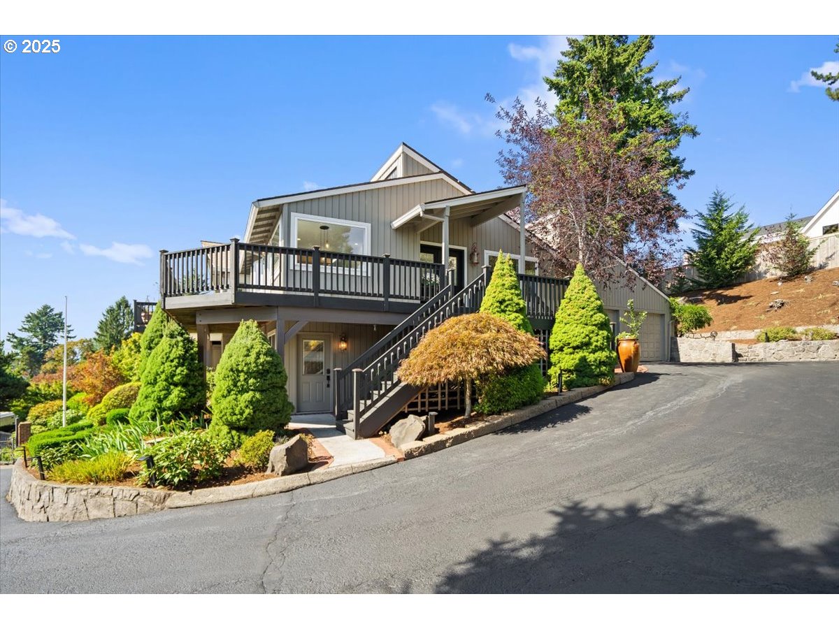 8014 Southeast Middle Way Vancouver, WA 98664 - Photo 35 of 47 a front view of a house with a yard and potted plants