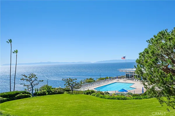 a front view of a building with garden