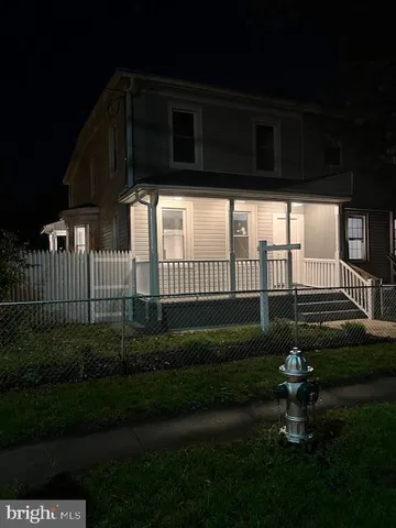 a view of swimming pool with an outdoor seating