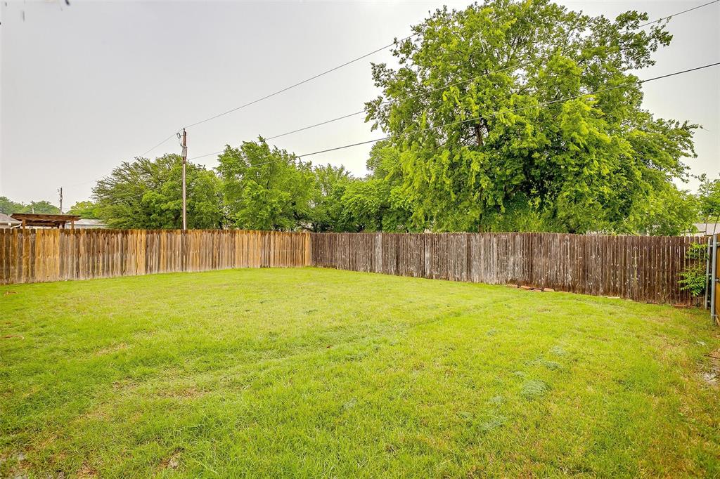 228 Lovers Path Drive Springtown, TX 76082 - Photo 37 of 40 View of yard featuring a fenced backyard
