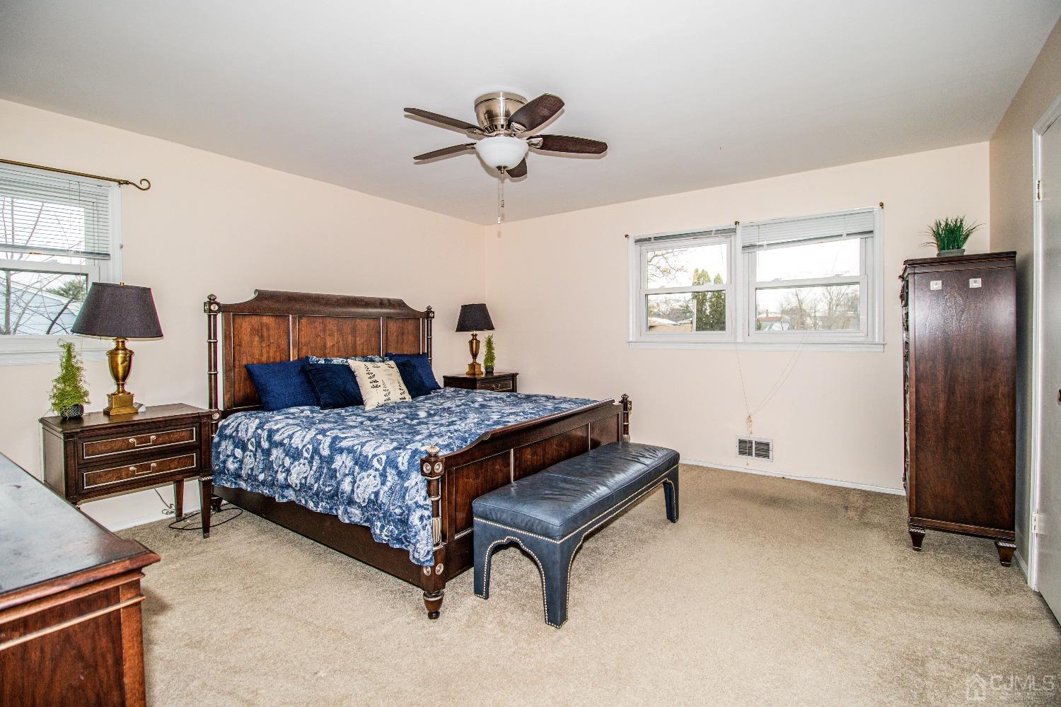 29 Devon Drive Piscataway, NJ 08854 - Photo 18 of 23 a bedroom with a bed dresser and window