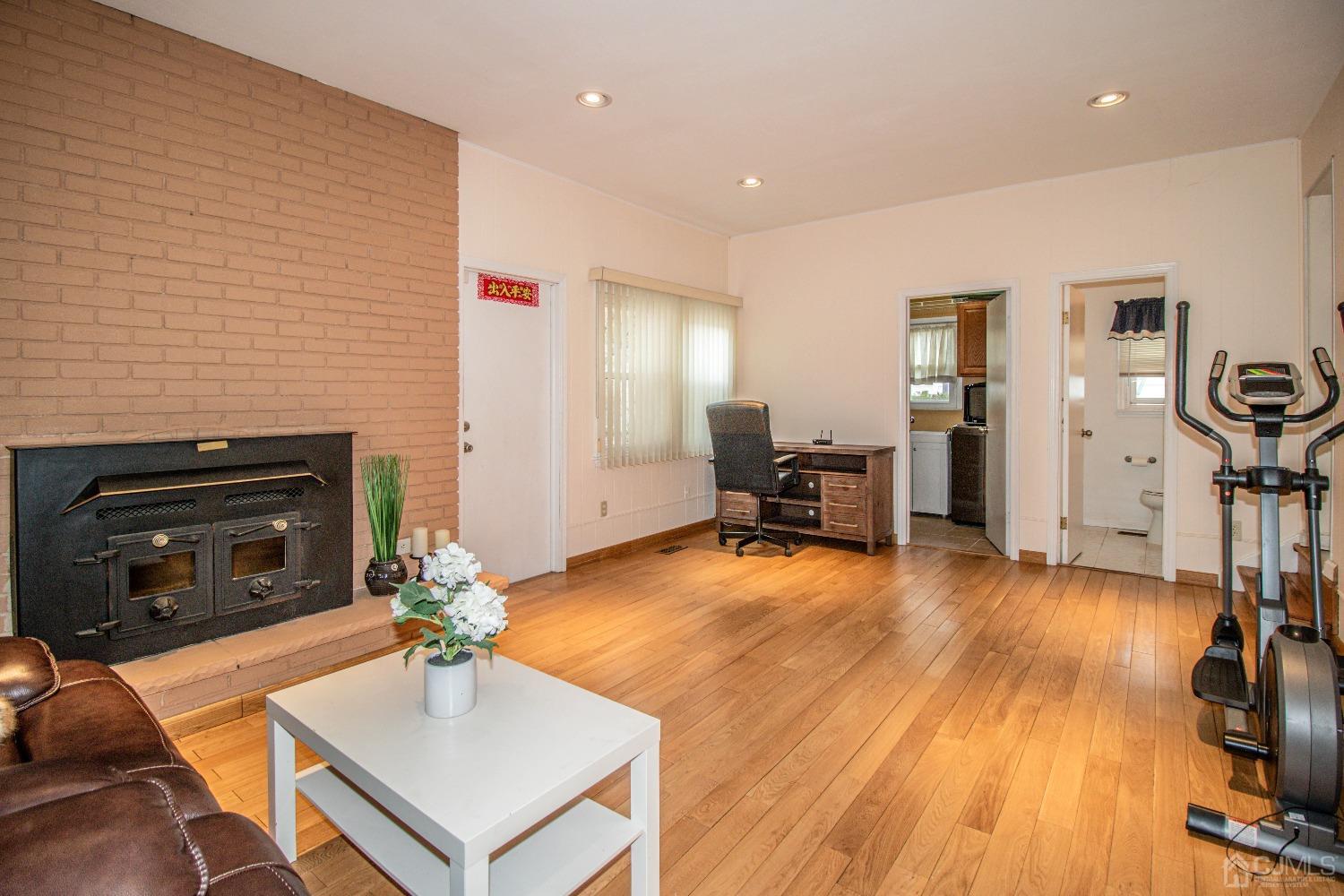 29 Devon Drive Piscataway, NJ 08854 - Photo 6 of 23 a living room with furniture and wooden floor