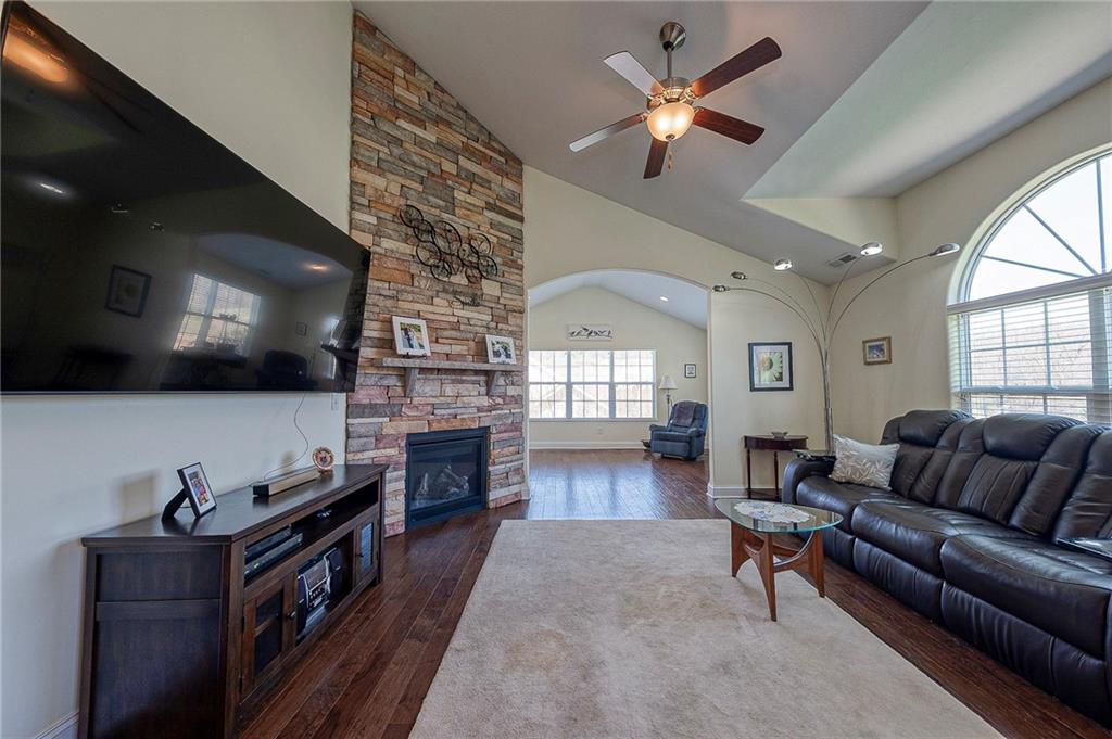 364 Saddlebrook Road Gibsonia, PA 15044 - Photo 5 of 39 Stunning floor to ceiling stone gas fireplace warms your living room.