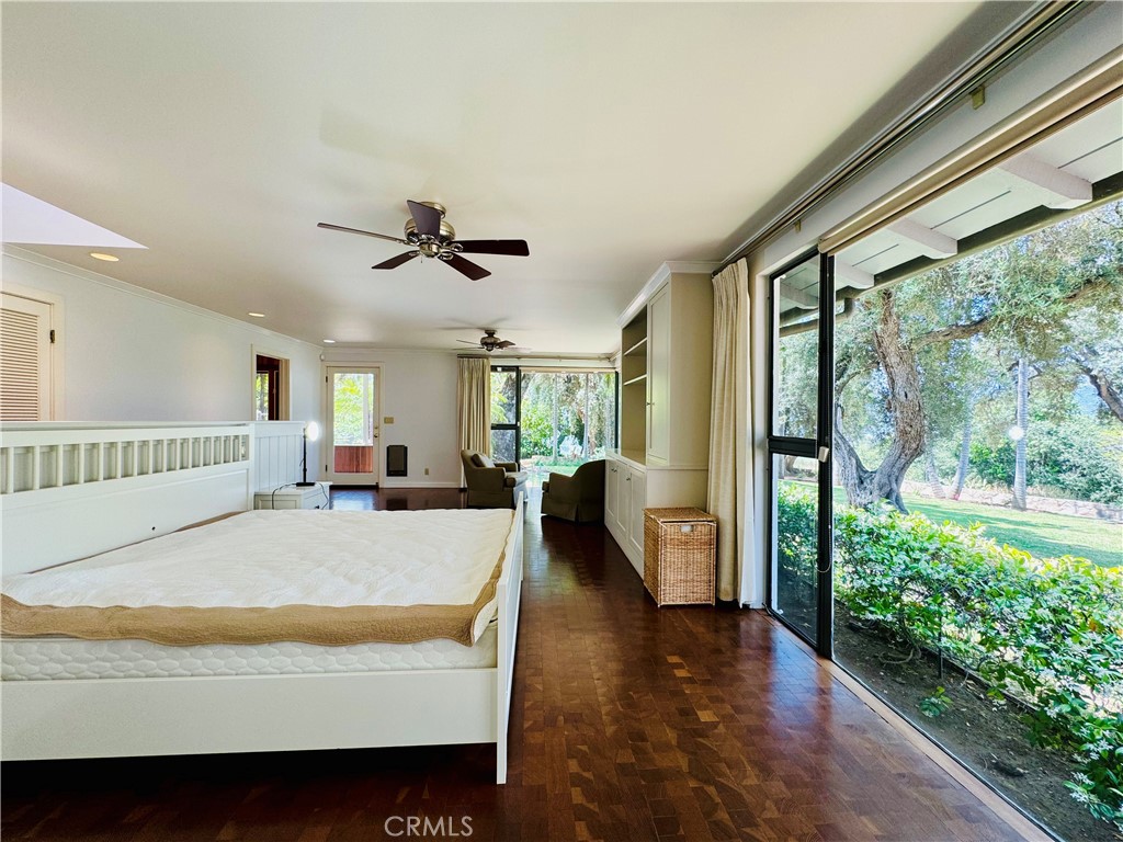 1777 La Cresta Drive Pasadena, CA 91103 - Photo 13 of 31 a bed sitting in a spacious bedroom next to a window