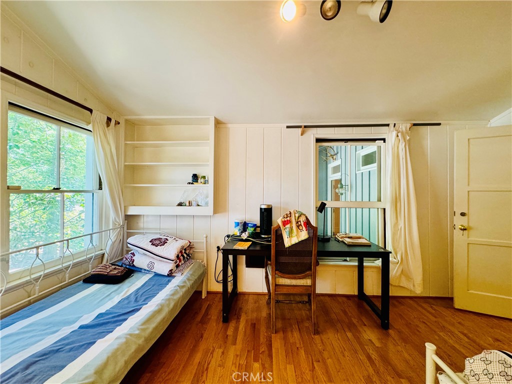 1777 La Cresta Drive Pasadena, CA 91103 - Photo 19 of 31 a living room with furniture and wooden floor