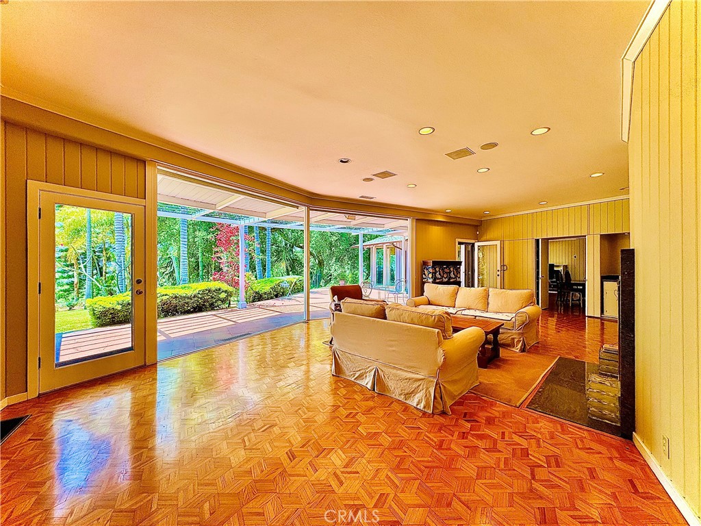 1777 La Cresta Drive Pasadena, CA 91103 - Photo 4 of 31 a living room with furniture and a large window