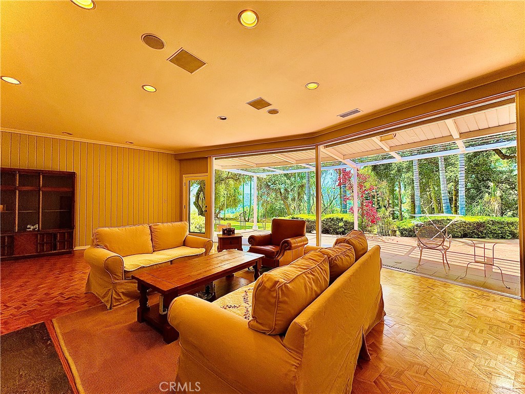 1777 La Cresta Drive Pasadena, CA 91103 - Photo 7 of 31 a living room with furniture and a large window
