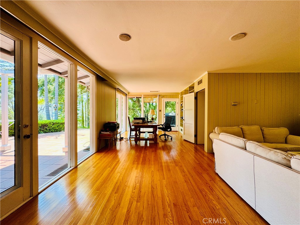 1777 La Cresta Drive Pasadena, CA 91103 - Photo 8 of 31 a living room with furniture and wooden floor