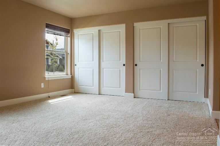 61723 Rigel Way Bend, OR 97702 - Photo 10 of 17 a view of an empty room with window and closet area