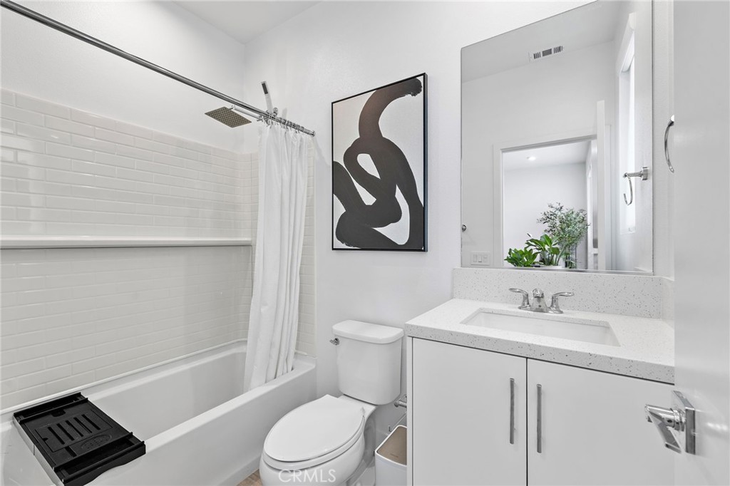1826 West Bushell Street Anaheim, CA 92805 - Photo 24 of 30 a bathroom with a sink a toilet and shower