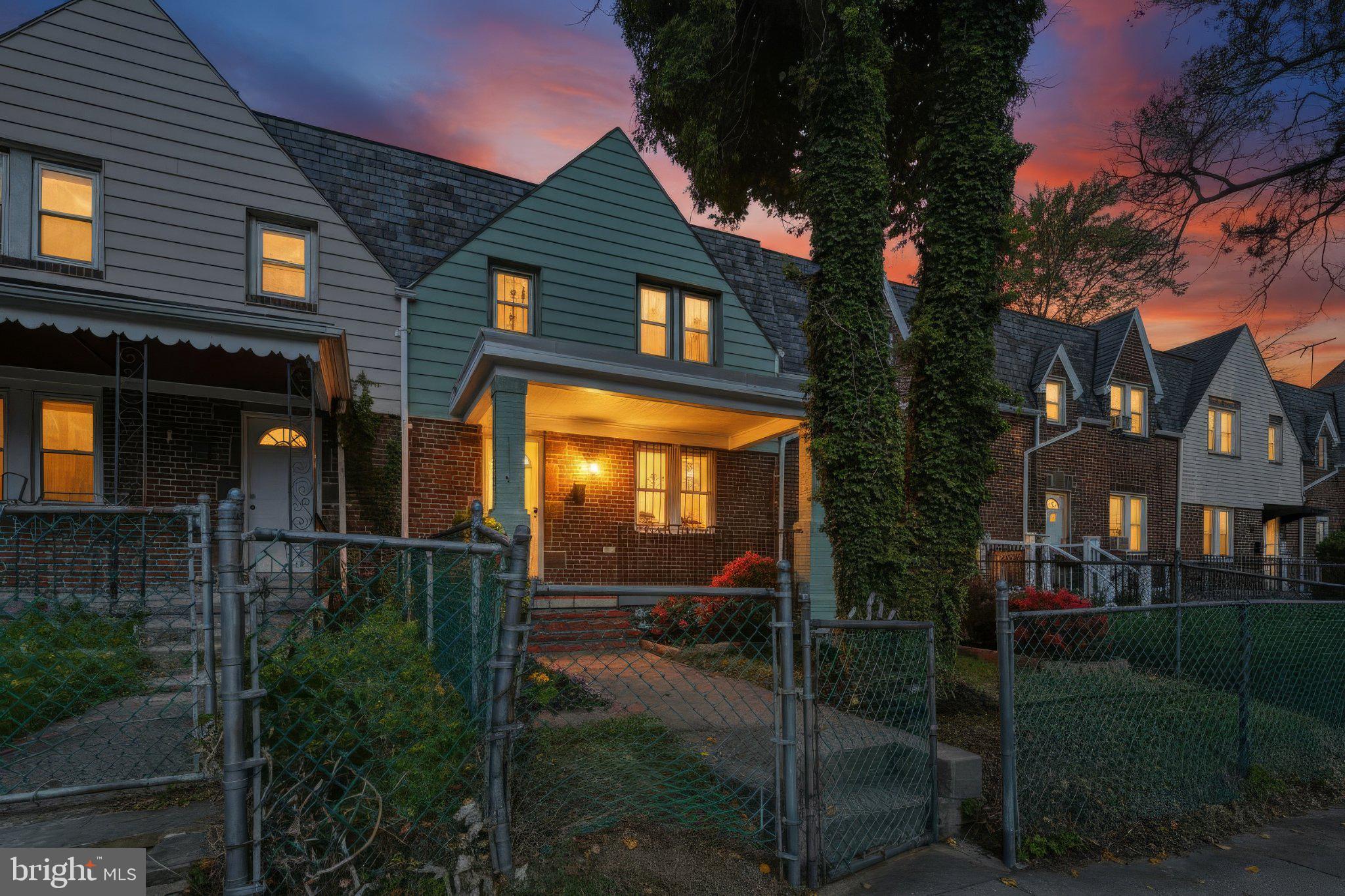 12 North Rosedale Street Baltimore, MD 21229 - Photo 1 of 25 Charming home at dusk, inviting glow.