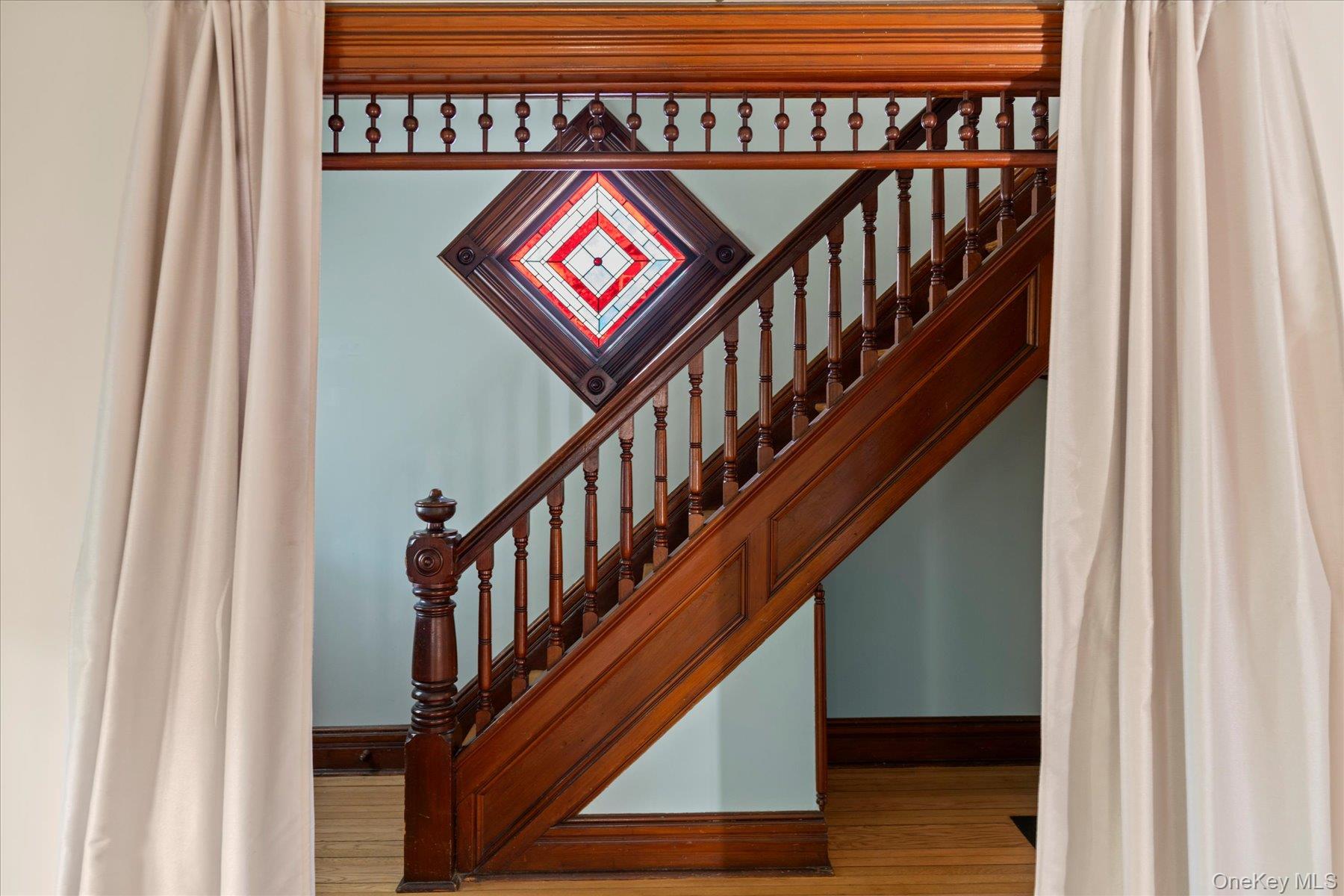 604 Main Street Greenport, NY 11944 - Photo 19 of 37 Original wood and stained glass details