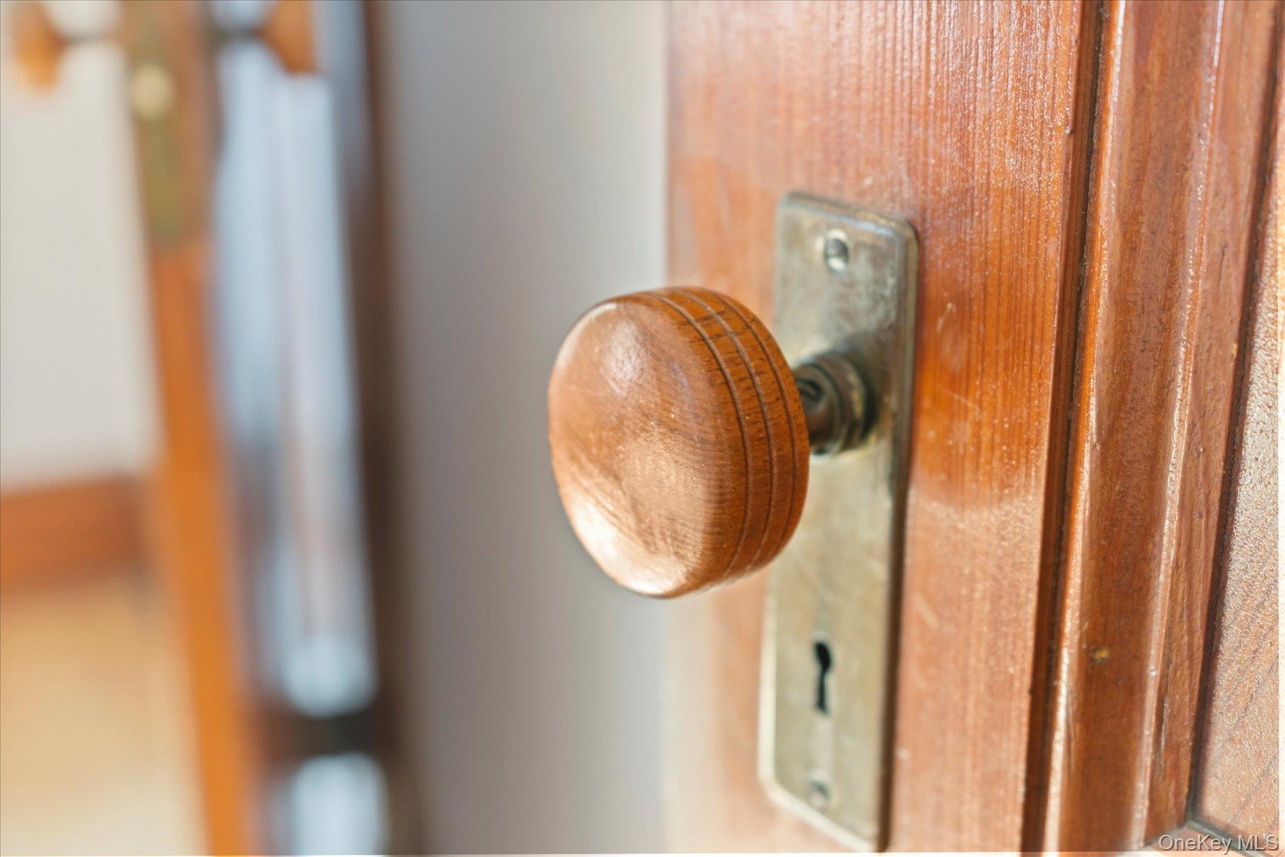 604 Main Street Greenport, NY 11944 - Photo 20 of 37 Detailed view of wood door knob