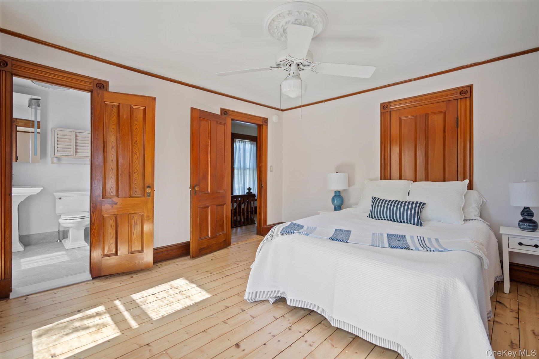 604 Main Street Greenport, NY 11944 - Photo 22 of 37 Primary bedroom featuring en suite bathroom