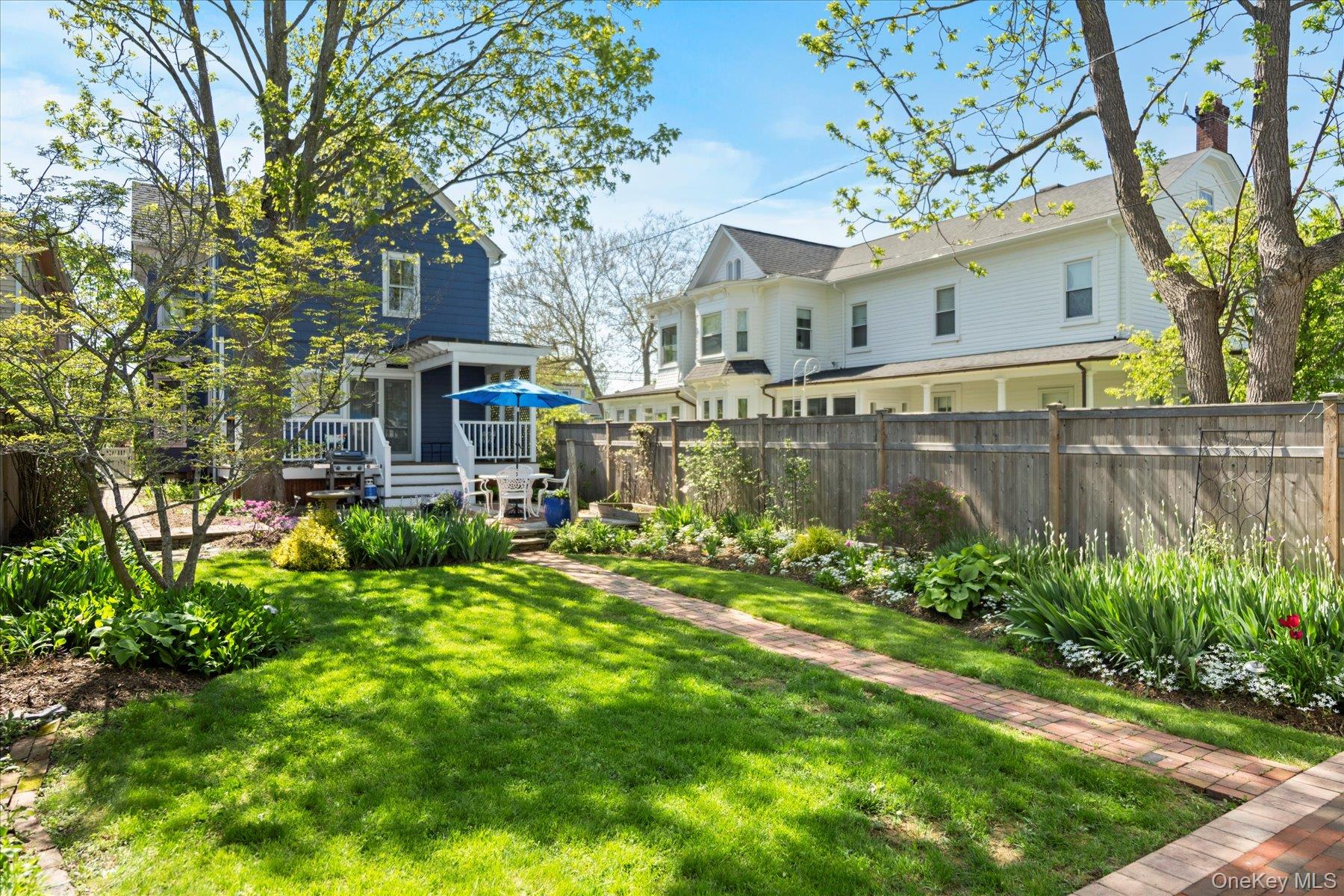 604 Main Street Greenport, NY 11944 - Photo 6 of 37 View of garden featuring deck