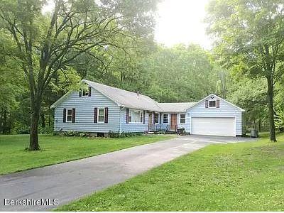 114 Cross Road Richmond, MA 01254 - Photo 1 of 1 a house with green field in front of it
