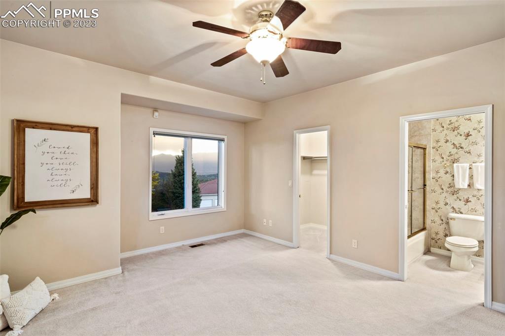 4120 Saddle Rock Road Colorado Springs, CO 80918 - Photo 16 of 50 a view of an empty room with a window