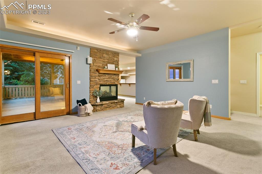 4120 Saddle Rock Road Colorado Springs, CO 80918 - Photo 39 of 50 a view of a dining room with furniture window and outside view