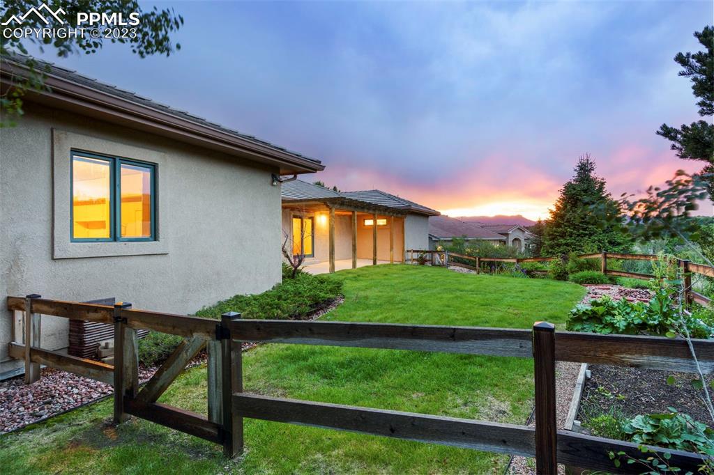 4120 Saddle Rock Road Colorado Springs, CO 80918 - Photo 50 of 50 a house view with a garden space