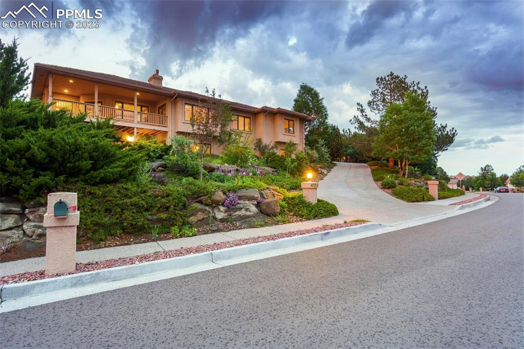 4120 Saddle Rock Road Colorado Springs, CO 80918 - Photo 5 of 50 a front view of a building with garden