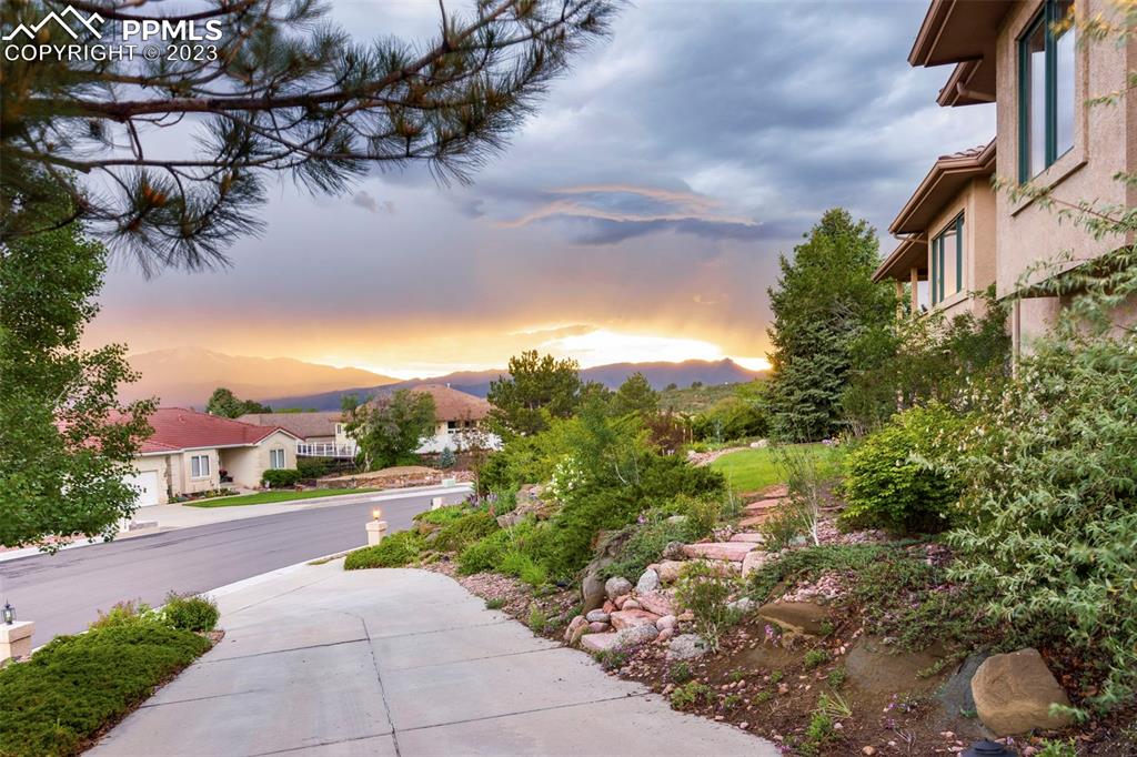 4120 Saddle Rock Road Colorado Springs, CO 80918 - Photo 7 of 50 a view of a street with houses