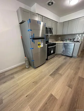 a view of small space with wooden floor