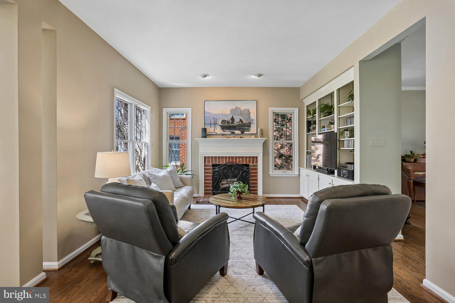 306 Beckwith Street Gaithersburg, MD 20878 - Photo 12 of 62 Family room with masonry fireplace